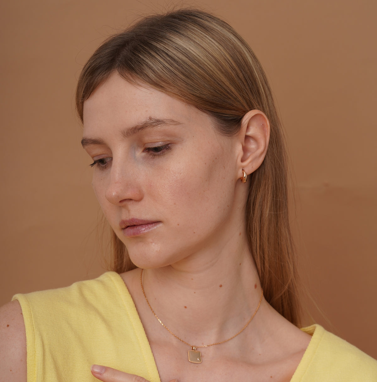 burren jewellery 18k gold plated swirl huggie hoop earring