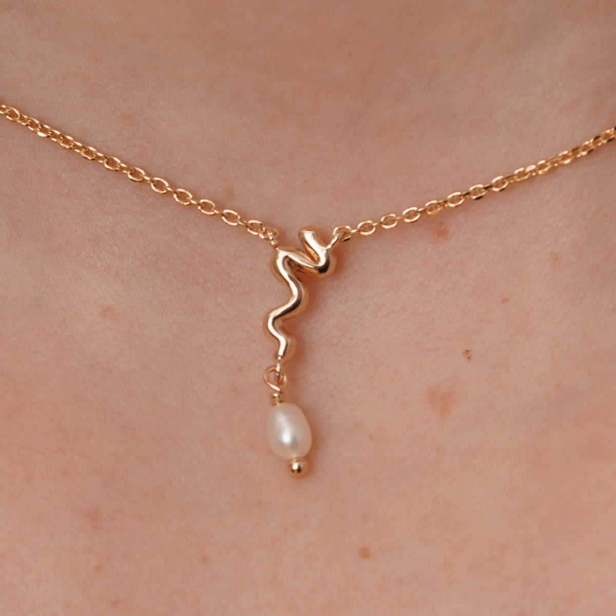 burren jewellery 18k gold plated necklace with wavy design and pearl beads