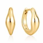 A pair of polished champagne gold colour huggie hoop earrings shown on a clean white background, with one earring standing upright and the other angled to show the open back.