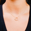 Burren Jewellery 18k gold plate open my heart necklace on model 