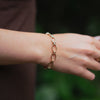 Burren Jewellery 18k gold plated all tied up bracelet wrist