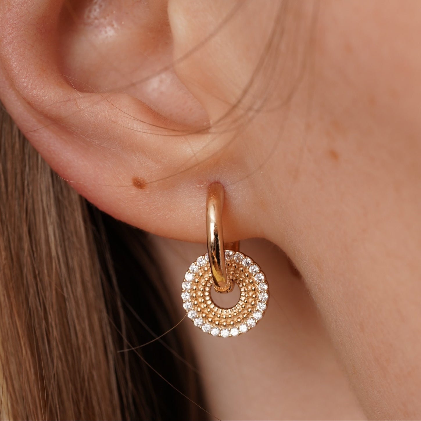 burren jewellery circular earrings with a outer ring of cz stone detailing 