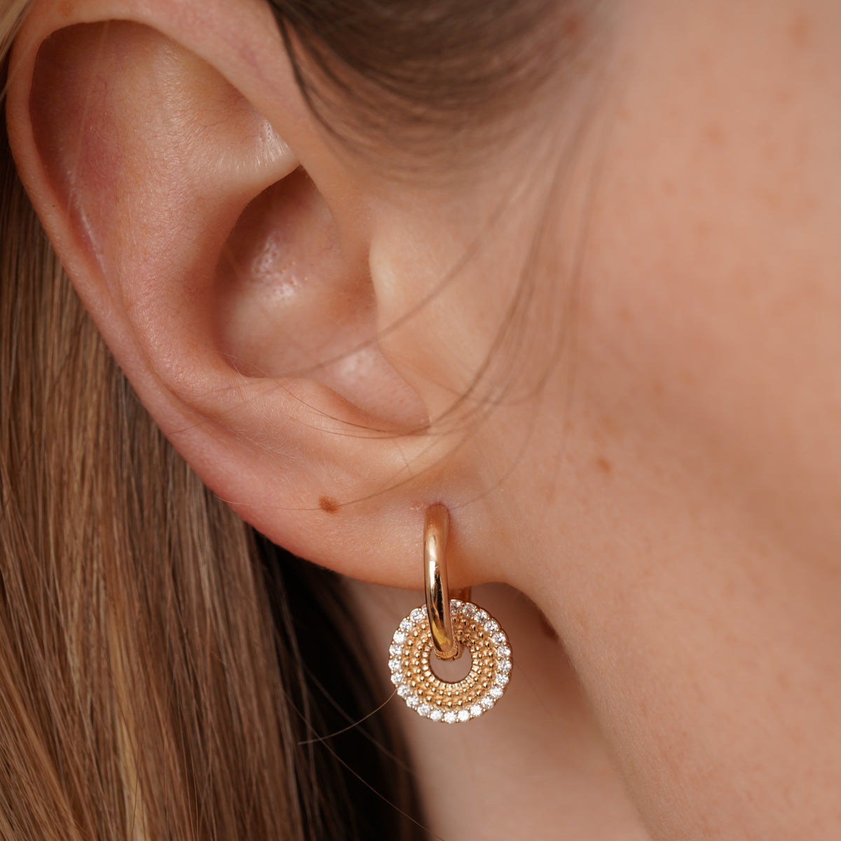burren jewellery circular earrings with a outer ring of cz stone detailing 