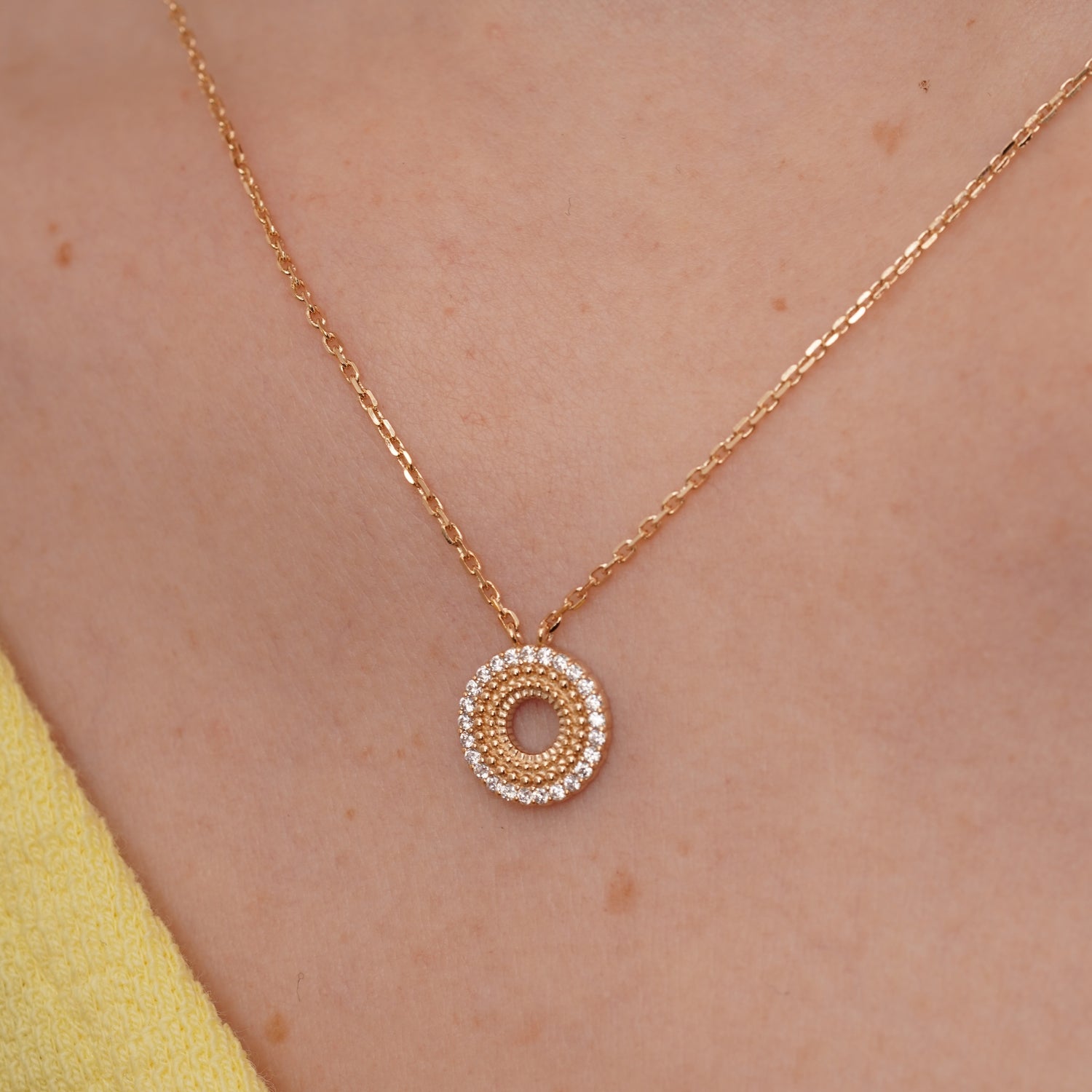 burren jewellery circular necklace with a outer ring of cz stone detailing 