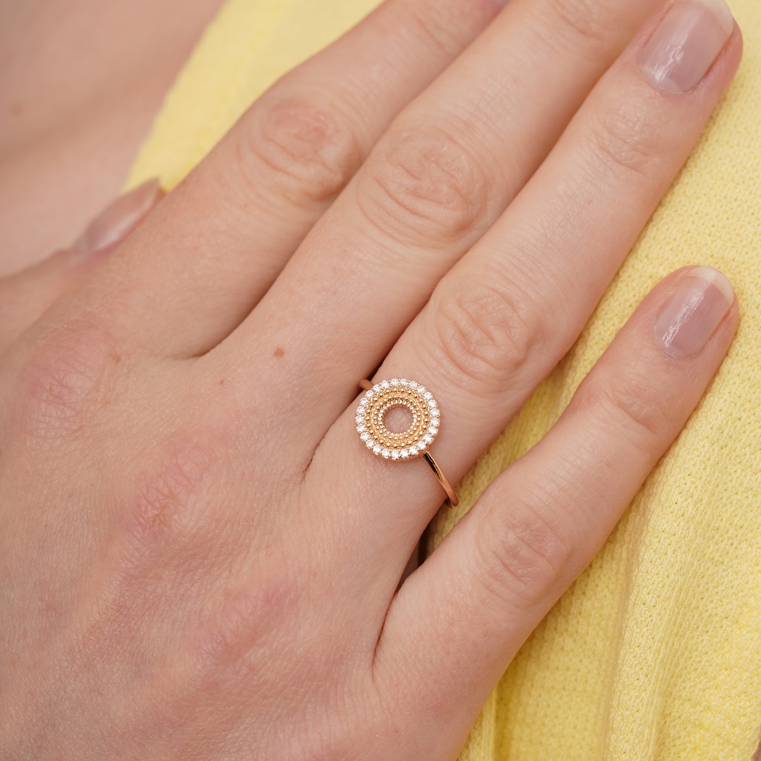 burren jewellery circular ring with a outer ring of cz stone detailing 