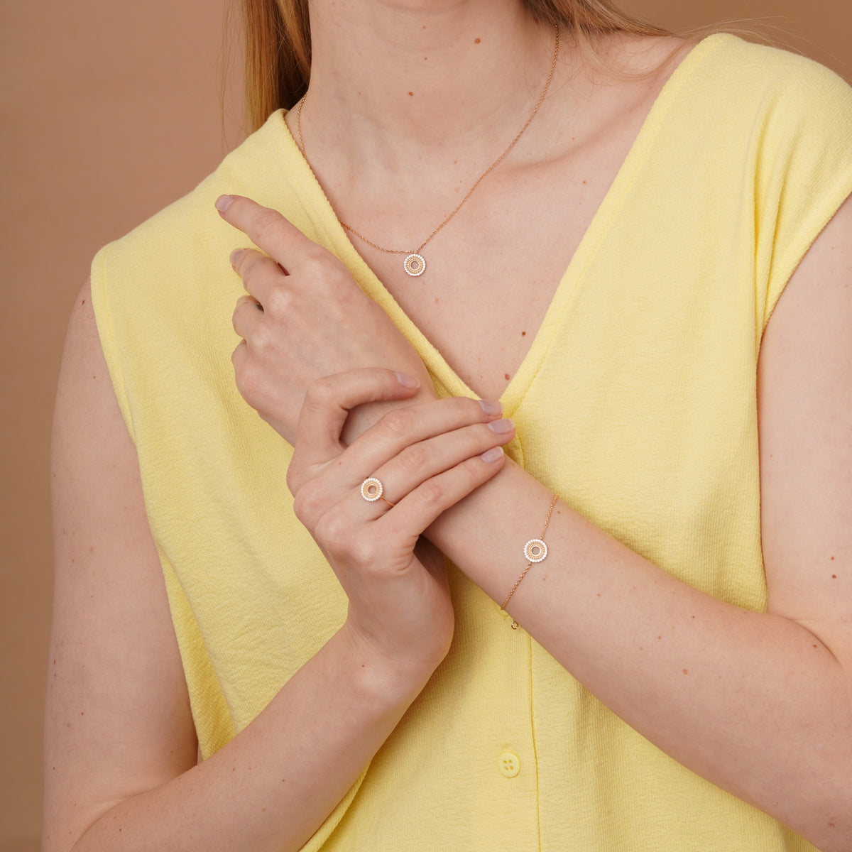 burren jewellery circular ring with a outer ring of cz stone detailing 