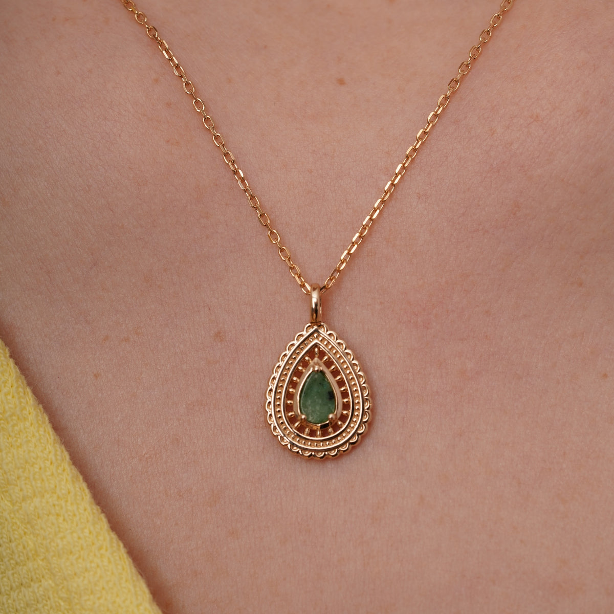 burren jewellery 18k gold plated intricate weave, green stone pendant 