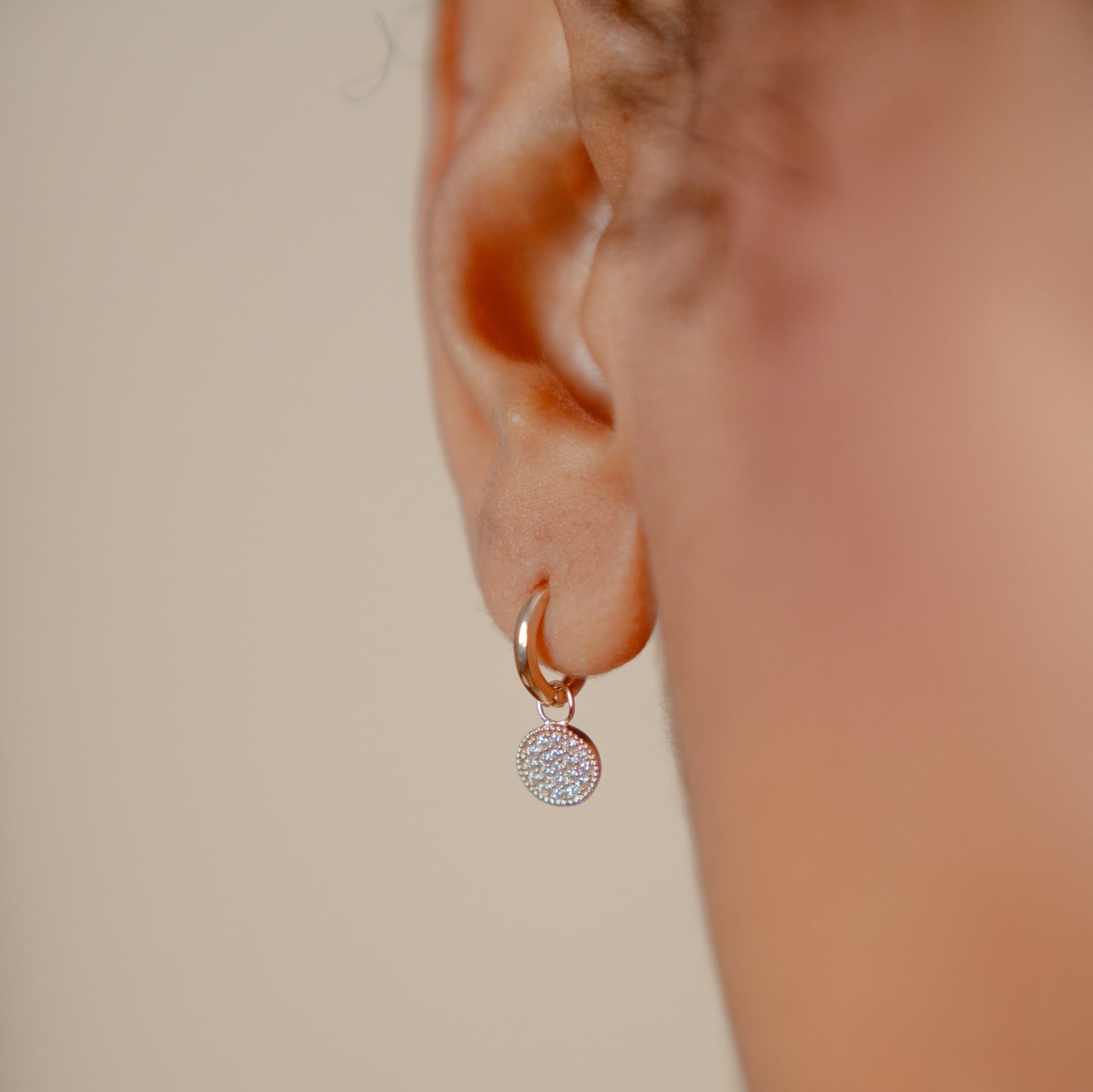 Burren Jewellery 18k gold plated pav ehh huggie earrings front