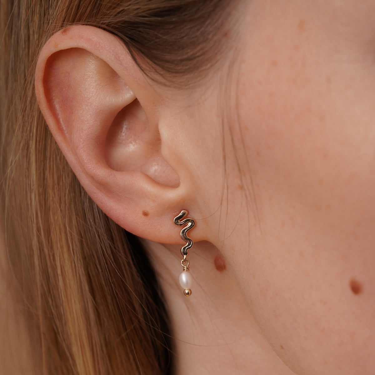 burren jewellery 18k gold plated earrings with wavy design and pearl beads 