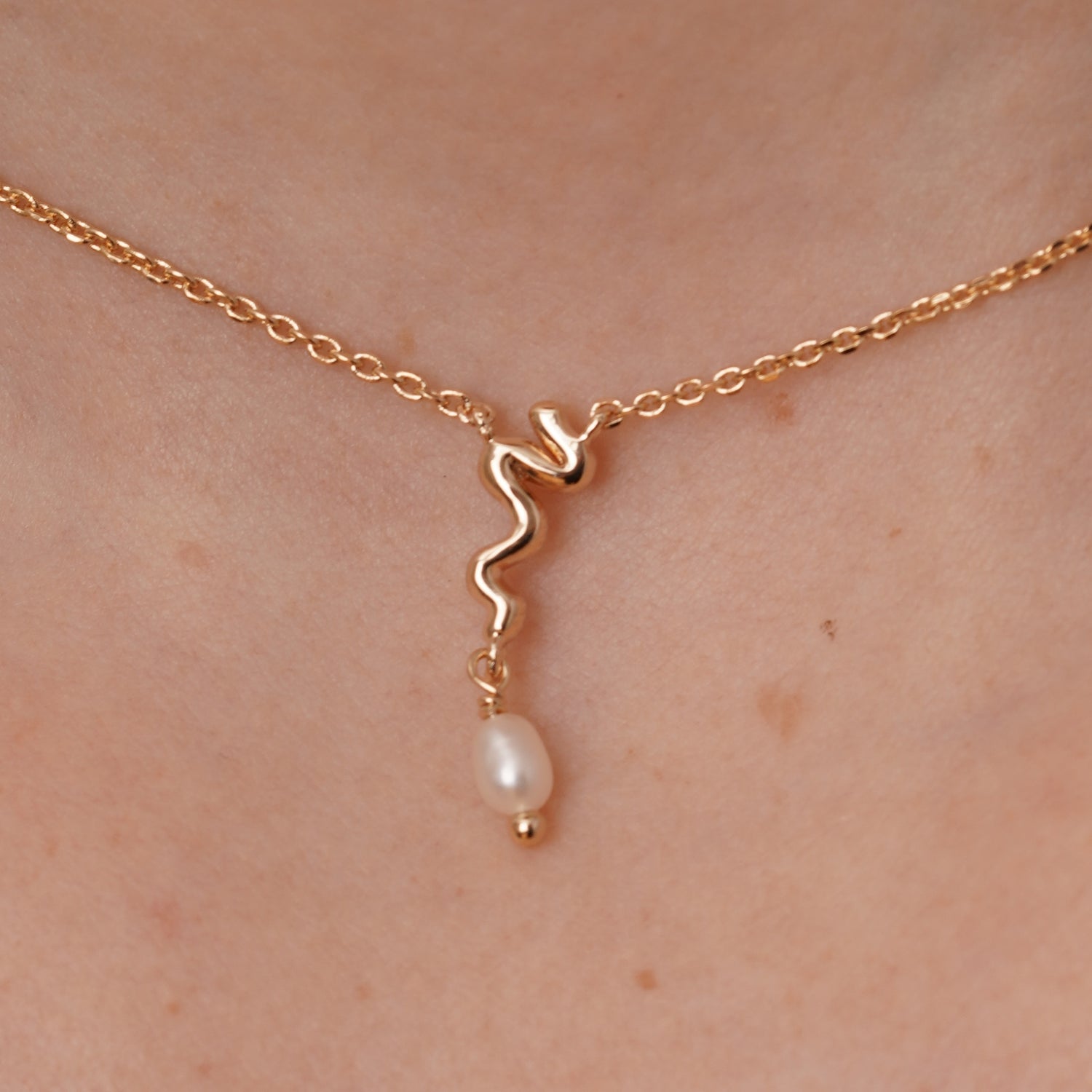 burren jewellery 18k gold plated necklace with wavy design and pearl beads 