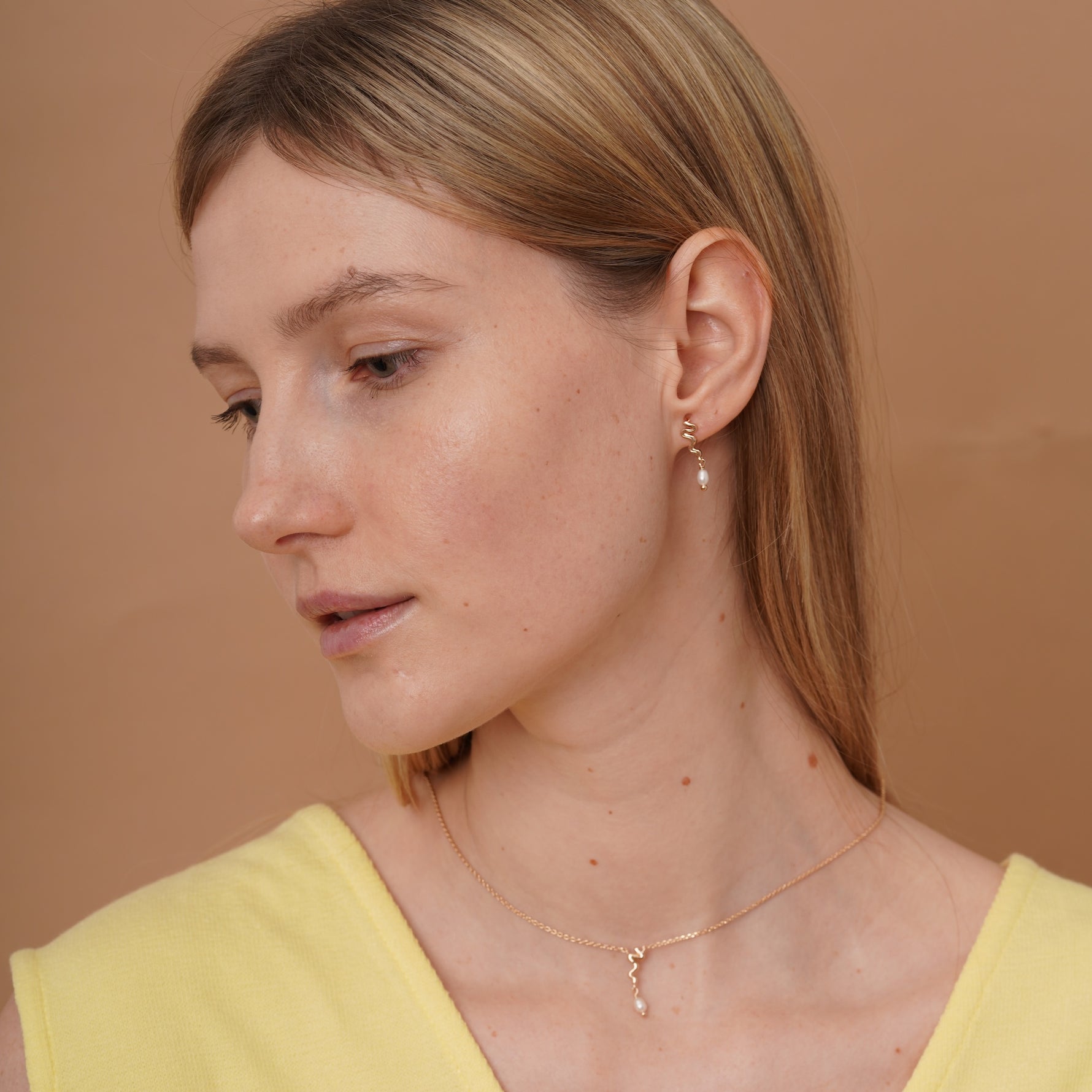 burren jewellery 18k gold plated necklace with wavy design and pearl beads 
