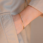 Burren Jewellery 18k gold plated slave to love bangle wrist