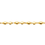 A close-up of Pink Lady Bracelet in 18K Gold Plating Featuring Alternating Polished Round and Teardrop Beads with an Adjustable Chain | Burren Jewellery