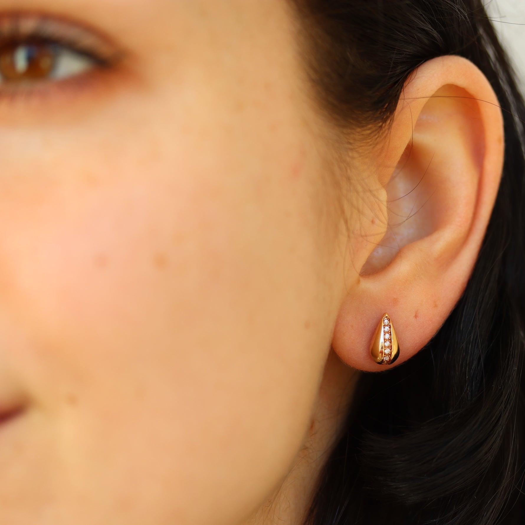 Burren jewellery 18k gold plate stud earrings cubic zirconia snowdrop on model