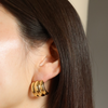 Burren jewellery 18k gold plated Three Times a Charm dome statement earrings close up