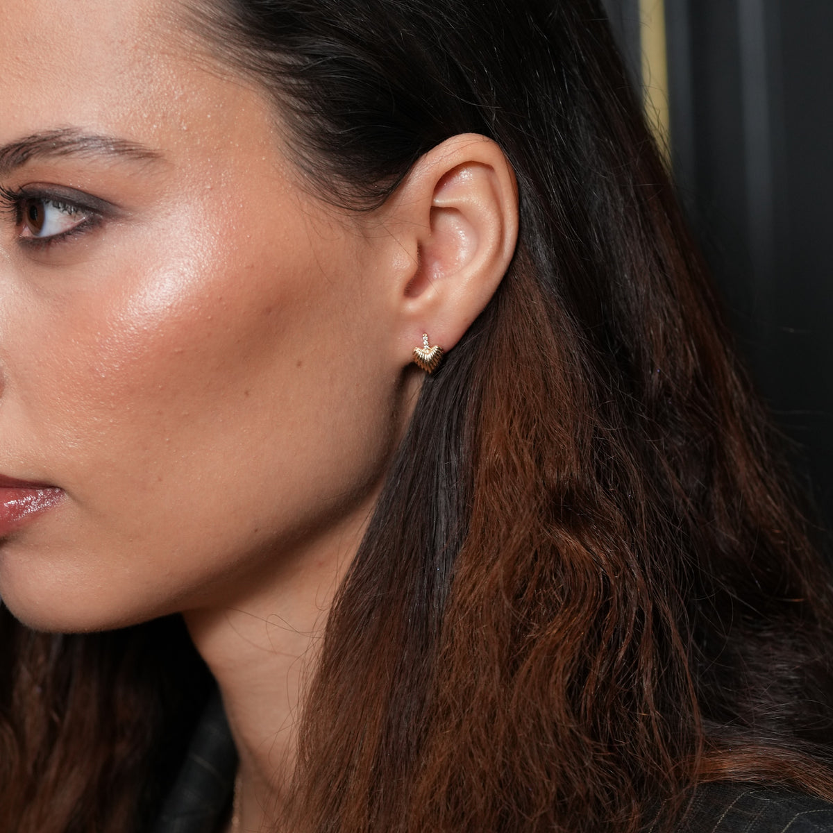 Burren jewellery gold heart earring on model