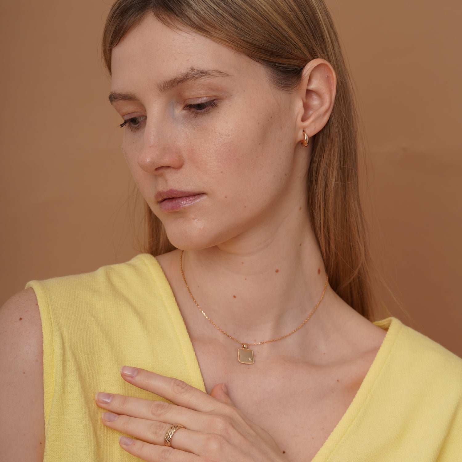 burren jewellery 18k gold plated square disk pendant with cz stone star detail