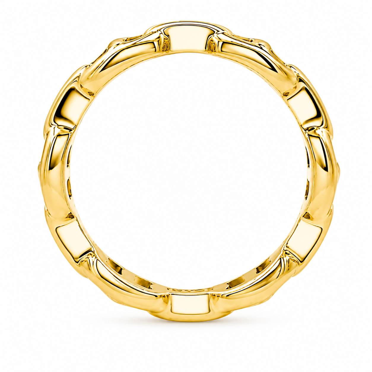 A polished yellow gold ring with a textured, segmented outer band, shown against a plain white background.