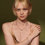 Model wearing Pure Soul 18K Gold Plated Baguette Cubic Zirconia Tennis Bracelet | Burren Jewellery