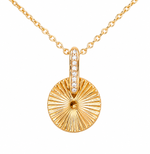 Closeup shot of the Radiance Pendant Necklace in 18K Gold Plating Featuring an Engraved Sunburst Pendant with Pavé Crystal Bail | Burren Jewellery