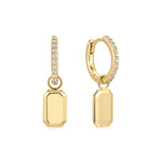 Replenish Life Earrings in 18K Gold Plating with Pavé Cubic Zirconia Huggie Hoops and Removable Polished Tag Charms with a vertical bar studded with small clear stones and a polished rectangular drop pendant, shown on a white background.| Burren Jewellery