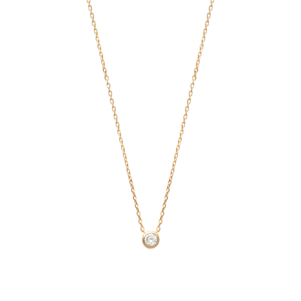 18K gold plate ‘Round About Midnight’ Necklace with centre Cubic Zircon stone in rub over setting