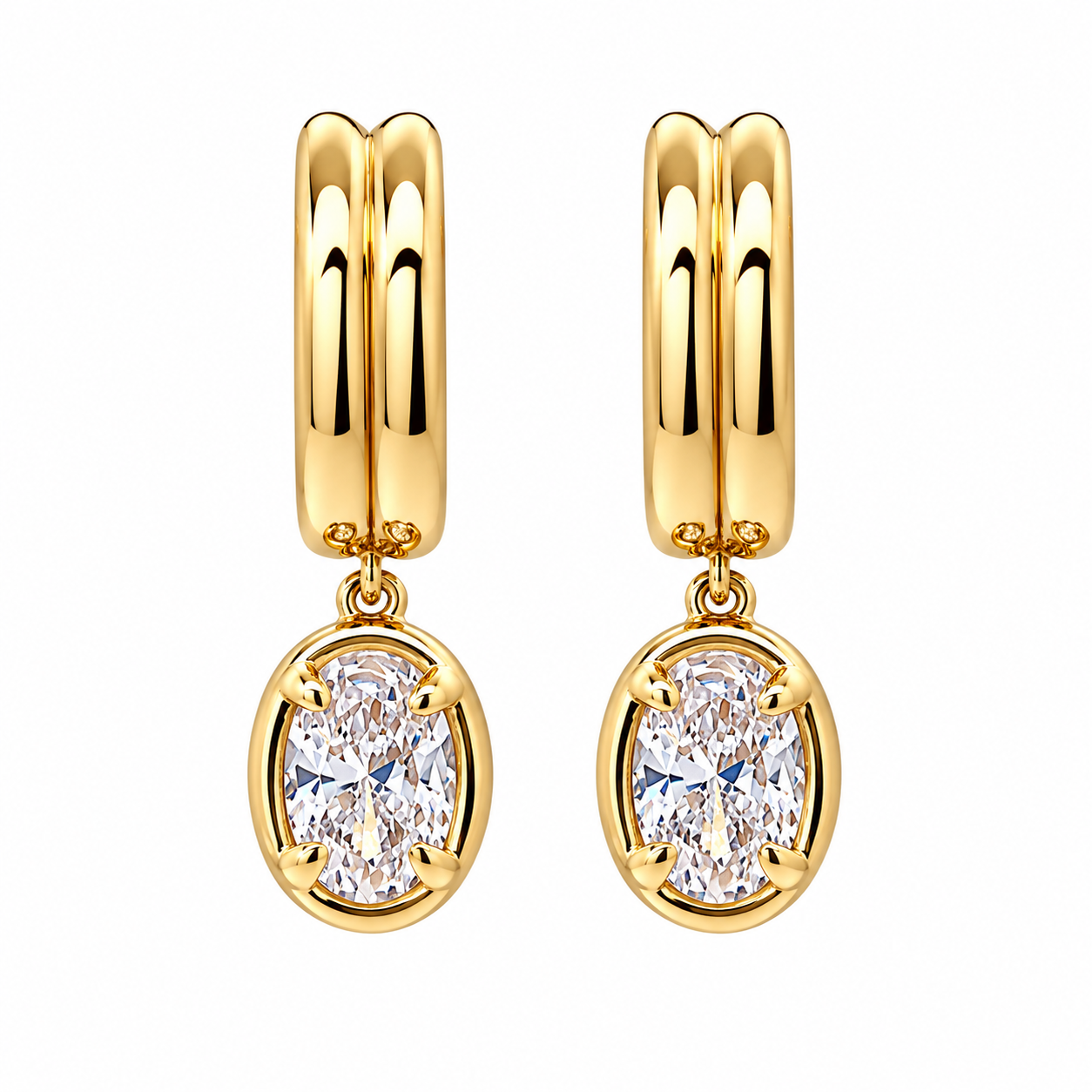 Timeless Solitaire Earrings in 18K Gold Plating Featuring Oval-Cut Cubic Zirconia Drop Charms on Polished Huggie Hoops | Burren Jewellery