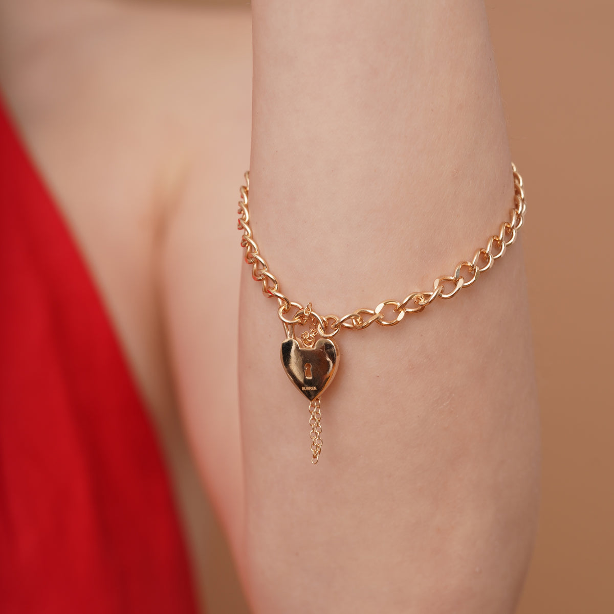 burren jewellery 18k gold plated chain bracelet with a heart-shaped padlock charm