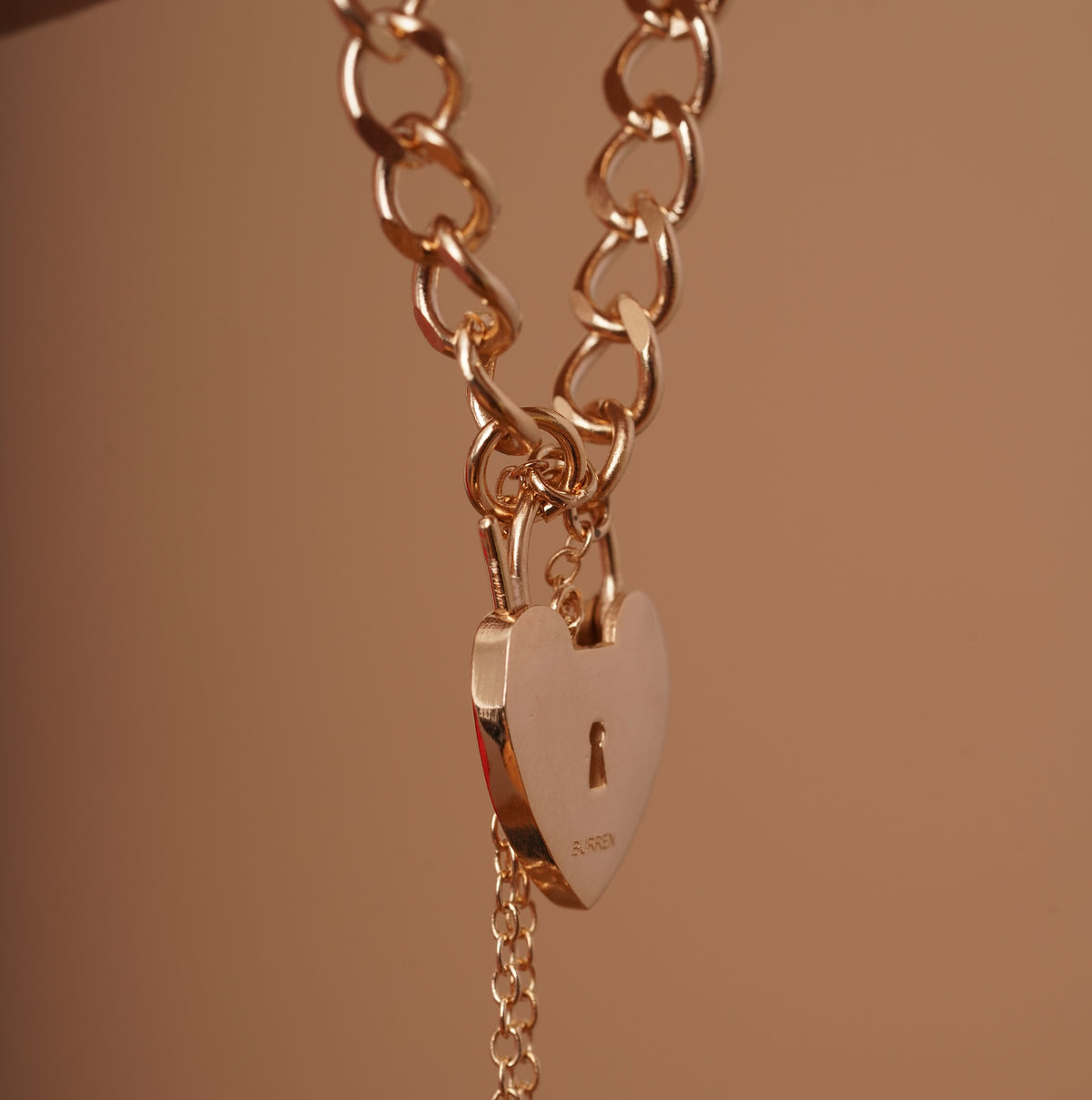 burren jewellery 18k gold plated chain bracelet with a heart-shaped padlock charm