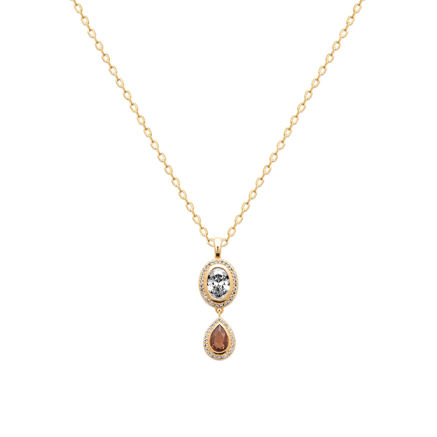 A gold chain necklace with a double-drop pendant featuring a round light blue gemstone and a teardrop-shaped reddish-brown gemstone, both surrounded by small clear stones, on a plain white background.