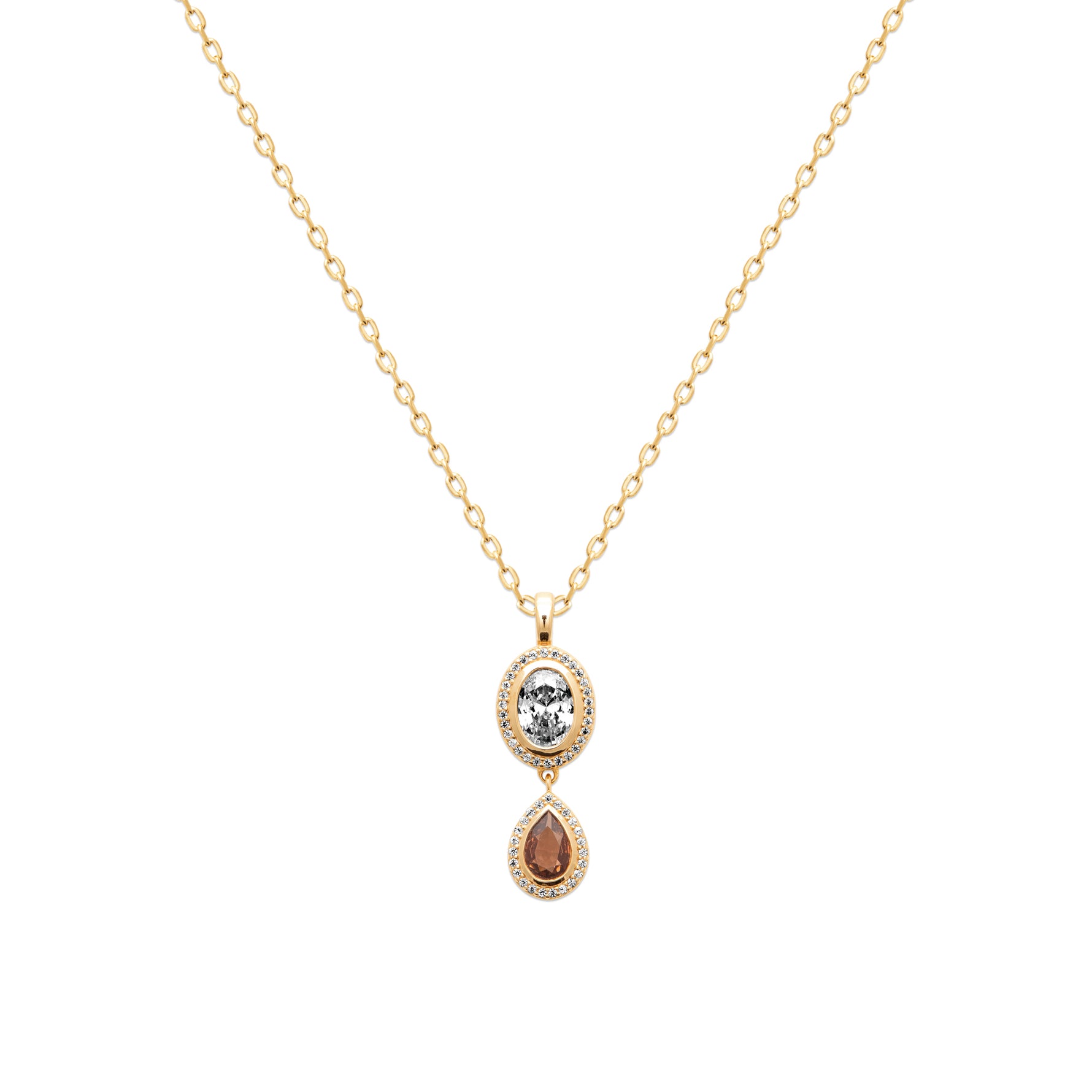 A gold chain necklace with a double-drop pendant featuring a round light blue gemstone and a teardrop-shaped reddish-brown gemstone, both surrounded by small clear stones, on a plain white background.