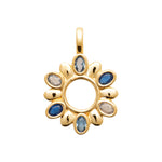 Gold pendant with blue gemstones on a white background