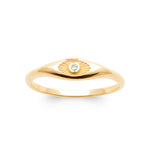 Gold ring with a green gemstone on a white background
