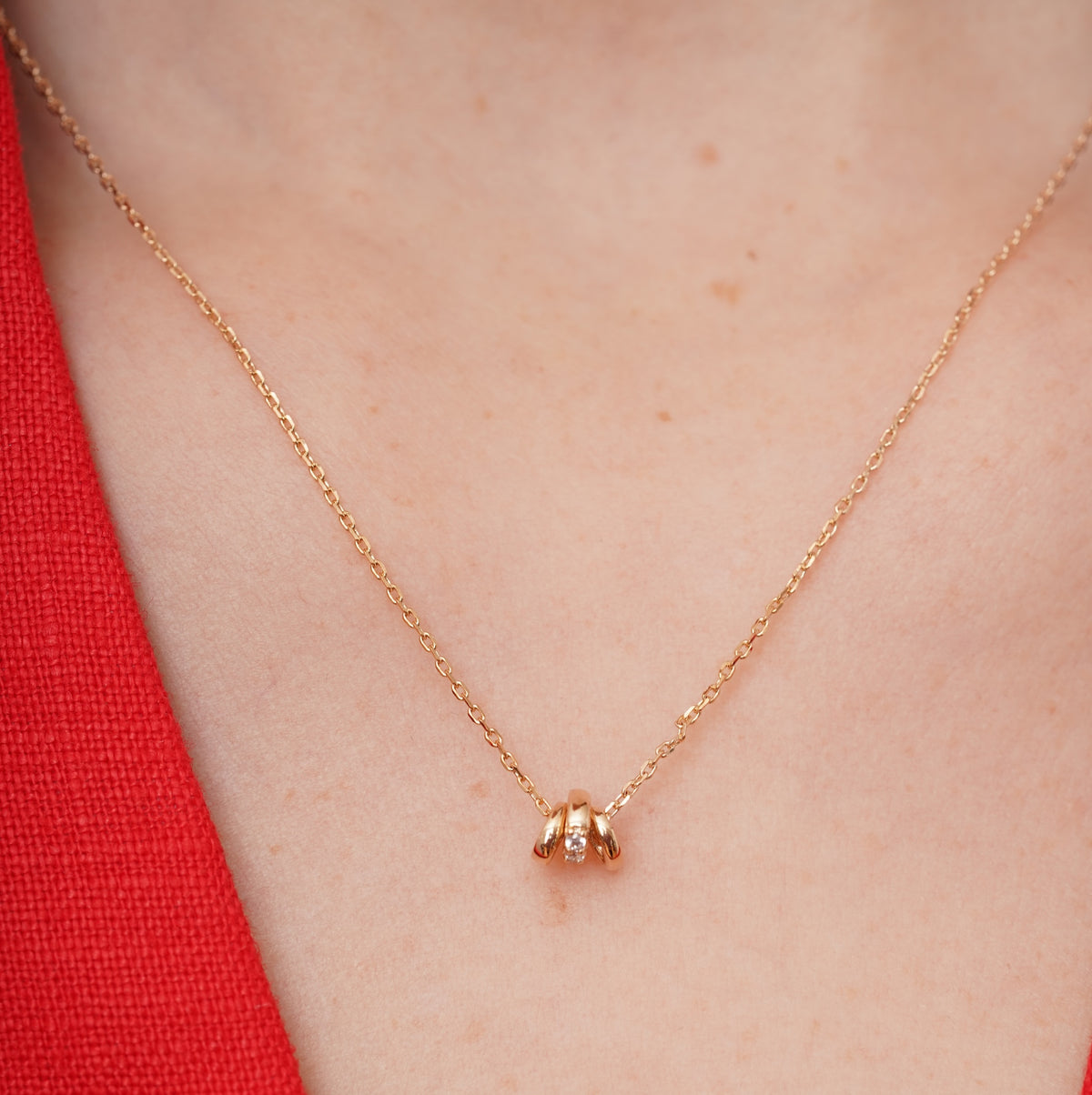 burren jewellery 18k gold plated necklace with a a 3 hoop pendant 