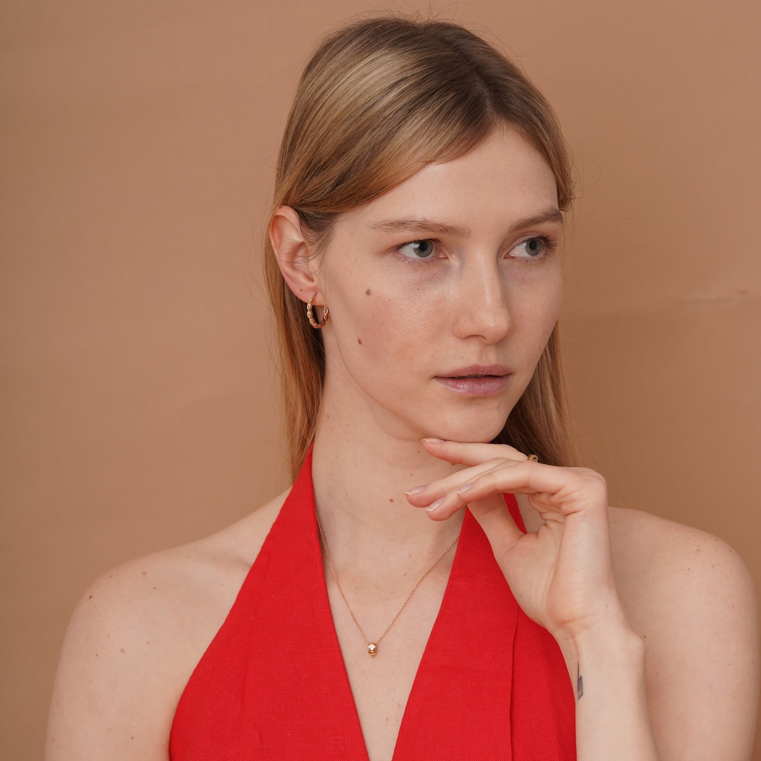 burren jewellery 18k gold plated necklace with a cylindrical pendant 