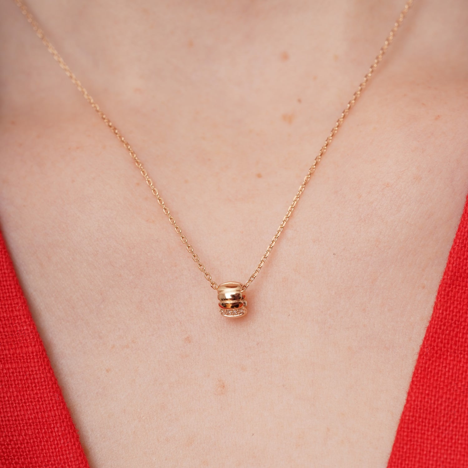 burren jewellery 18k gold plated necklace with a cylindrical pendant 