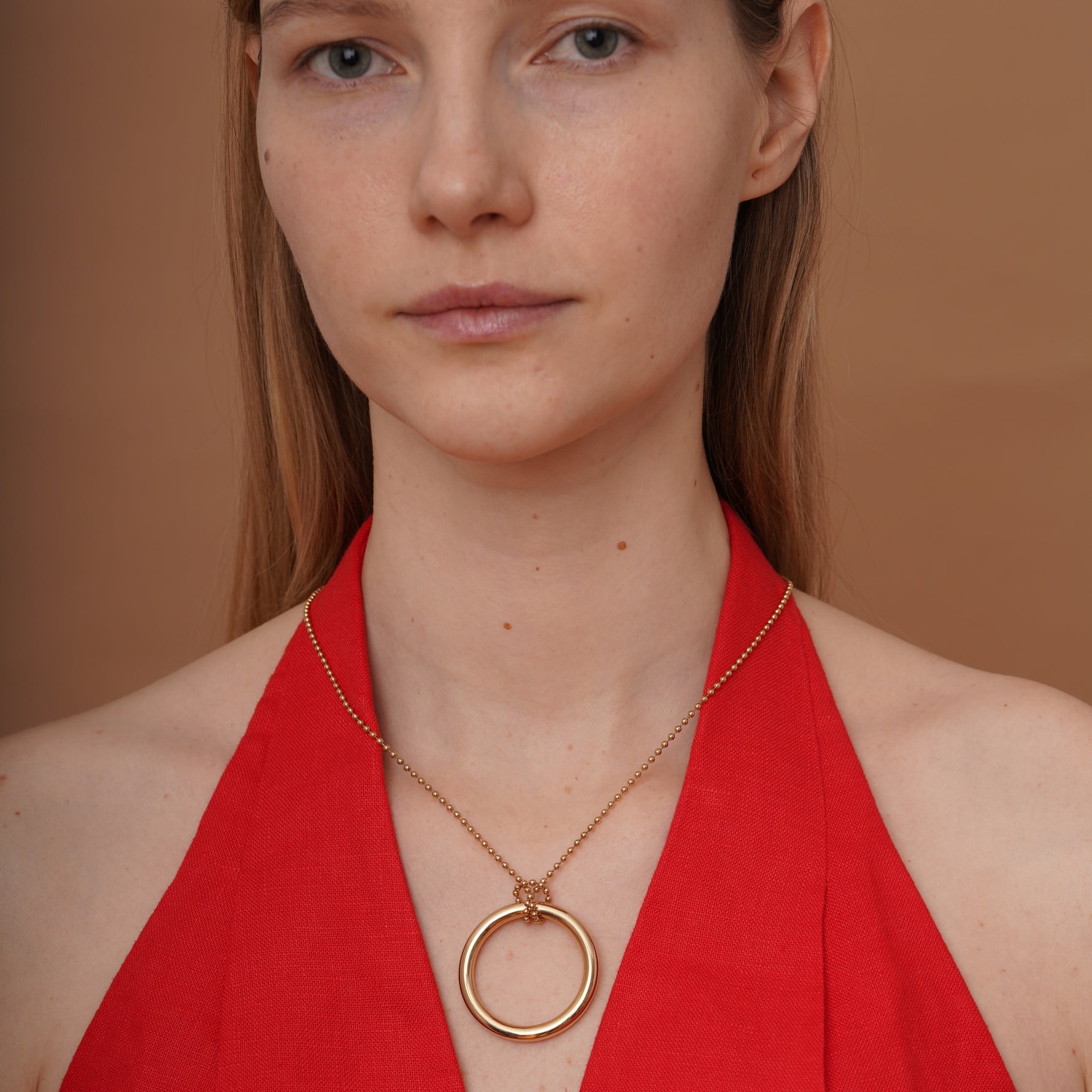 burren jewellery 18k gold plated large hoop pendant on a long chain 