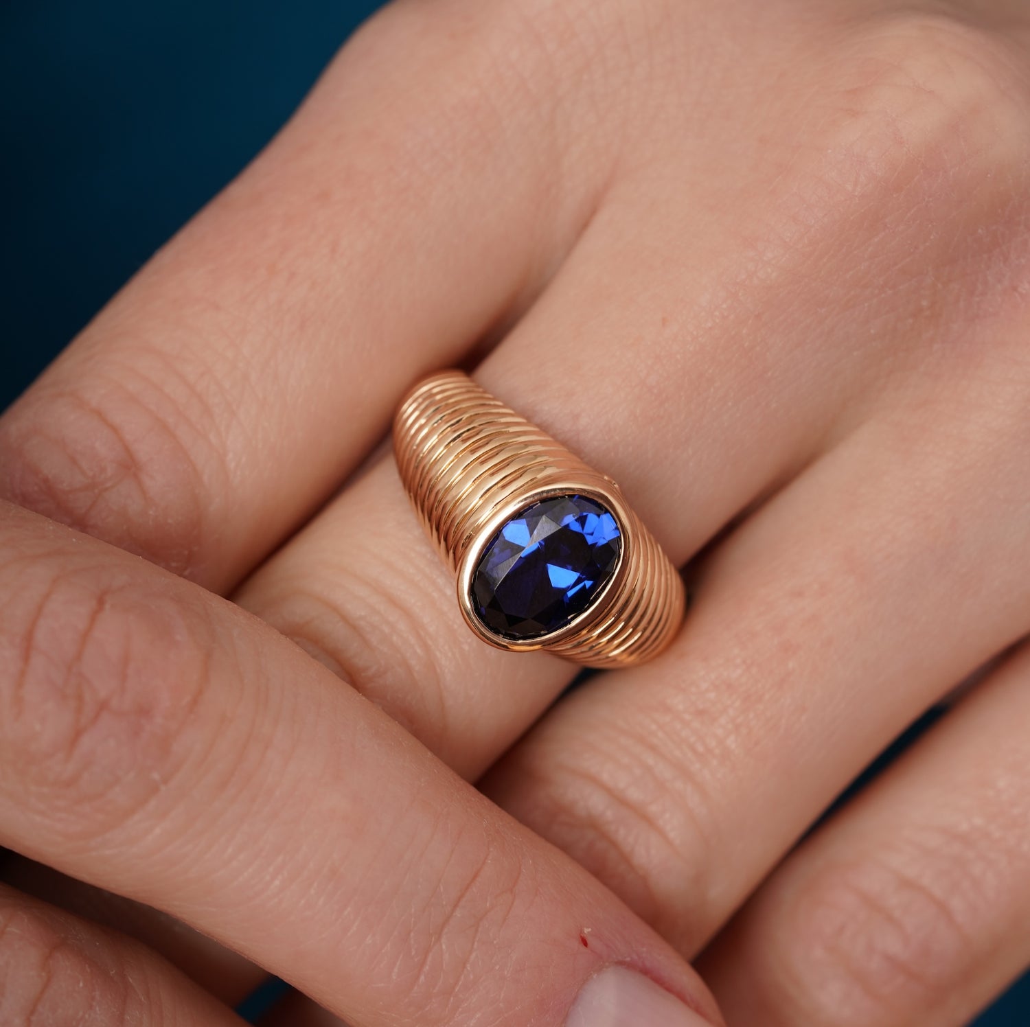 burren jewellery 18k gold plated chunky ribbed ring with a blue sapphire stone 