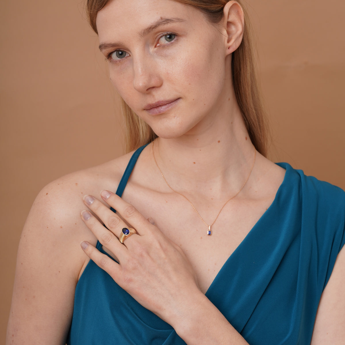 burren jewellery 18k gold plated chunky ribbed ring with a blue sapphire stone 