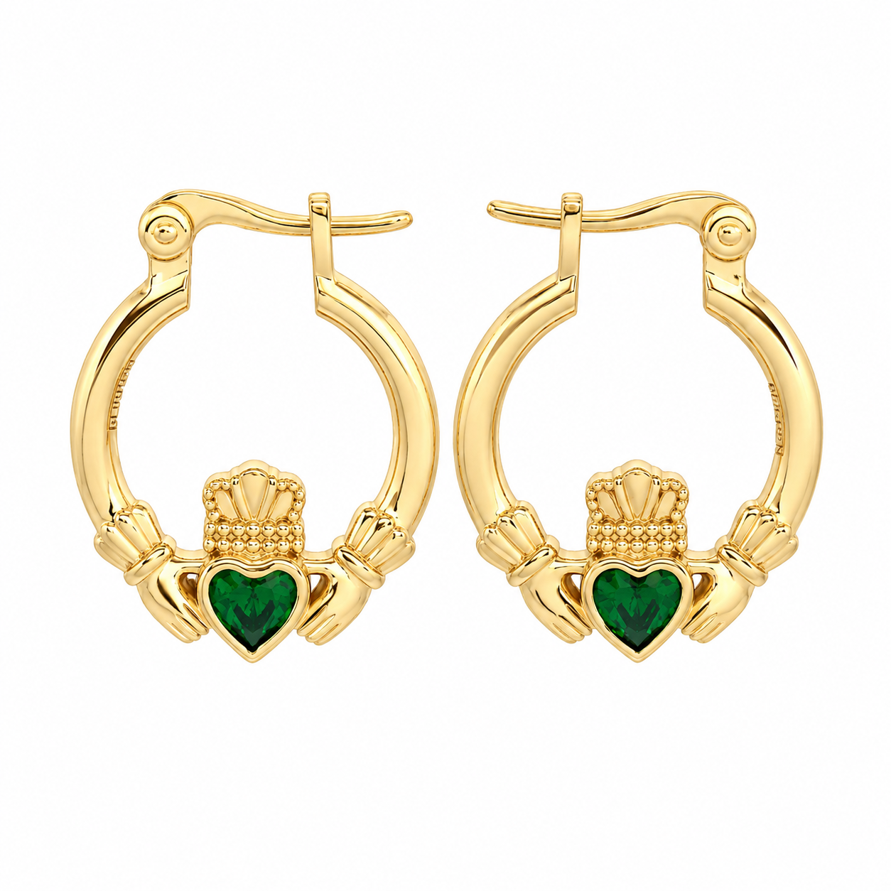 A pair of gold plated hoop earrings with a claddagh heart design, featuring a green heart in the center of each earring, set against a plain white background.