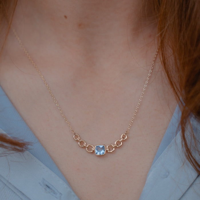 Burren Jewellery 18k gold plate close your eyes blue topaz necklace