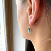Burren Jewellery The Pair A Yea 18K gold plate earring with blue agate pear shape stone set on model