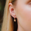 Burren Jewellery 18k gold plated all you deserve huggie earrings model