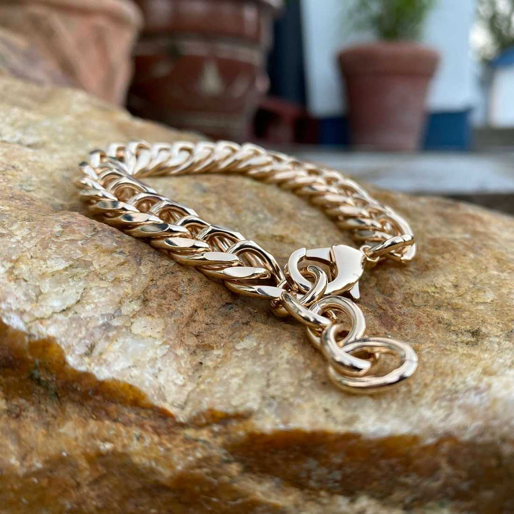 Burren Jewellery 18k gold upside down bracelet on rock